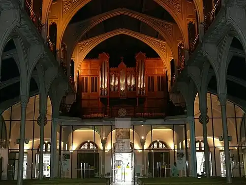 The grand organ in the tribune, illuminated