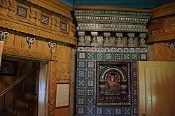 Stove with tiles in the bathhouse