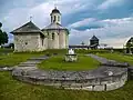 Foundation of Assumption Cathedral (foreground) and Church of Assumption of Blessed Virgin Mary (background)