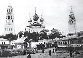 Temple ensemble. The Church of the Holy Cross (1795), old (the beginning of the 18th century) and new (1858) bell towers. Now Revolution Square.