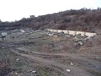 Ruins with the 2015 Memorial Cross