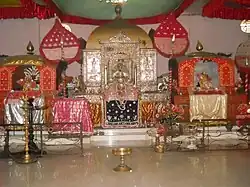 The singhason (throne) of the main idol Govinda in the Manikut of the Auniati Satra