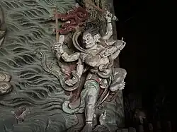 Yuan dynasty (1271-1368) figure of a Wisdom King, one out of a pair flanking a central figure of Guanyin, at Fusheng Temple[zh] in Yuncheng, Shanxi, China