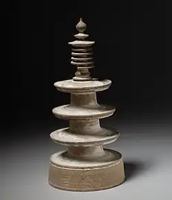 A photo of a miniature wooden pagoda