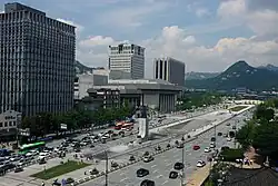 Gwanghwamun, with Sejong Arts Center the Ministry of Foreign Affairs in the center, and Gyeongbokgung and Bukhansan to the right.