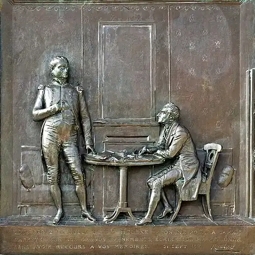 Bronze statue of Napoleon and another person with text engraved underneath reading "vous serez le Sully de Ste Hélène on ne pourra jamais s'arreter sur nos grands evenements, écrire sur ma personne sans avoir recours a vos mémoires. 21 Sept 1815" followed by what is presumably the artist's signature