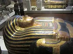Pharaonic sarcophagi covered in gold leaf