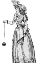 A 1791 illustration of a woman playing with an early version of the yo-yo, which was then called a "bandalore"