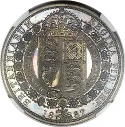Silver coin with a heraldic shield on it