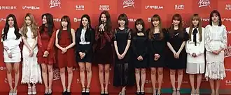 Iz*One at the 33rd Golden Disc Awards in 2019 L–R: Hyewon, Chaeyeon, Minju, Hitomi, Eunbi, Wonyoung, Sakura, Nako, Yuri, Chaewon, Yena, and Yujin
