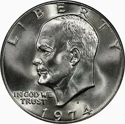 One side of a coin, depicting the bust of a man