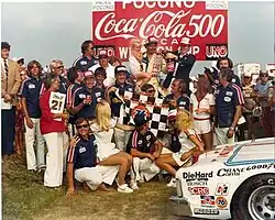 Neil Bonnett in the winner's circle after winning the 1980 Coca-Cola 500