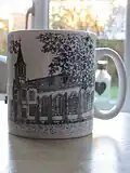 The front of the mug features the original building designed by Decimus Burton