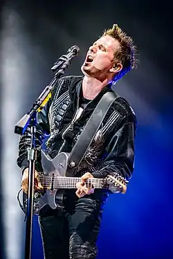 Bellamy performing with Muse in June 2018