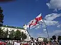 Protesters in Baranavichy holding a flag with the Pahonia, 16 August 2020