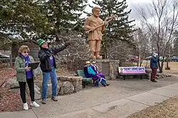 Mayor, Elizabeth Olson introduces the Changing of the Guards at the St Urho statue