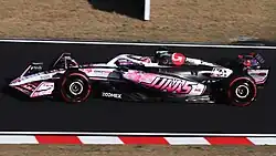Ocon driving the Haas VF-25 at the 2025 Japanese Grand Prix