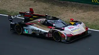 A blue Cadillac Le Mans Daytona hypercar