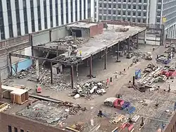 View of the top floor as workers demolish parts of the old structure