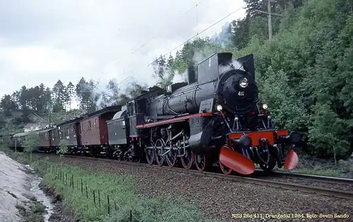 NSB class 26c, no.411 vintage train near Drangedal in 1984