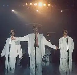 3T singing "I Need You" during their concert in Hannover, Germany (Brotherhood Tour 1996)