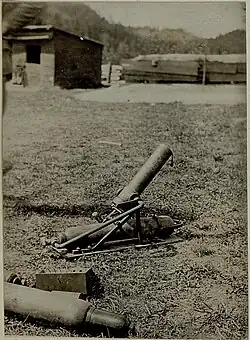 A black and white photograph of a mortar