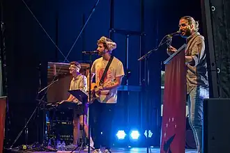 AJR performing in 2023. From left to right: Ryan Met, Jack Met, Adam Met.