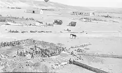 Water basin under construction, with horse tethered in centre