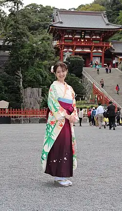 A Japanese woman wearing a hakama with a furisode (formal kimono for young women with long sleeves)