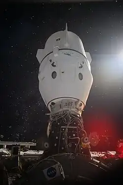 Crew Dragon Endeavour docked to the zenith port of the Harmony module of the ISS, as seen from inside the Boeing Starliner Calypso