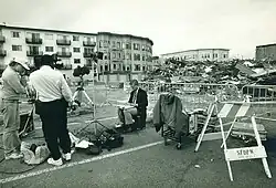 Image 1A journalist works on location at the Loma Prieta Earthquake in San Francisco's Marina District October 1989. (from Broadcast journalism)