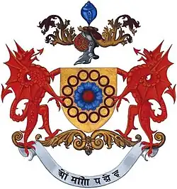 Before 1975, the motto on the coat of arms was different - OM MANI PADME HUM. (Oh, the jewel of creation is in the Lotus).[2]