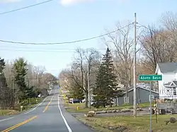 The hamlet of Adams Basin along CR 212