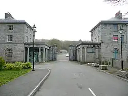 Piers and Lodges on Admiralty Way (formerly listed with Dockyard Wall)
