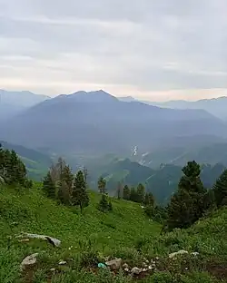 Aerial perspective capturing the topography and clustered habitation