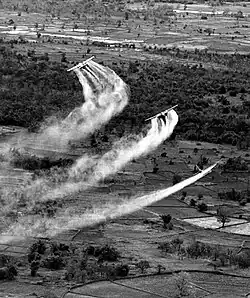 Three U.S. Fairchild UC-123B aircraft spray Agent Orange as part of the overall herbicidal warfare operation in Vietnam called Trail Dust, circa 1962–1971