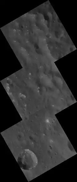 Hollows (irregular bright patches) in eastern Al-Hamadhani crater