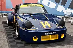 Holbert's 1974 Porsche 911 Carrera RSR 3.0 on static display at the Porsche Rennsport Reunion IV