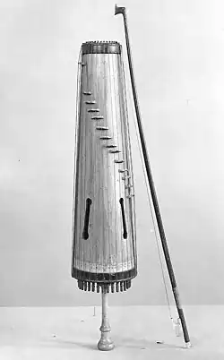 A stringed musical instrument and bow