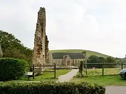 The Grade II* listed Pynion End gable, with the tithe barn beyond