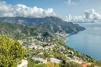 Amalfi Coast, Italy, attracts international tourists of all classes annually[27] and is listed as a UNESCO World Heritage Site.[28]