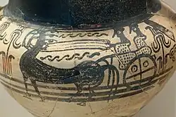 Tall, wide-necked vessel decorated with a simple geometric drawing of a chariot.