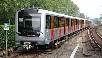 A M7 series EMU at Heemstedestraat station