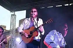 Bennett performing at Queens Square, Wolverhampton in 2018