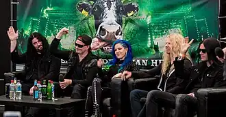 Arch Enemy in 2016; from left to right: Sharlee D'Angelo, Michael Amott, Alissa White-Gluz, Jeff Loomis, and Daniel Erlandsson