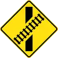 (W7-9) Railway Level Crossing on Road ahead (skewed) (left)
