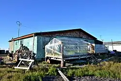 Ayon, private building with greenhouse