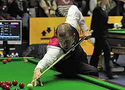 Barry Hawkins playing a shot