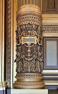 Beaux Arts acanthuses on the base of a column in the Grand Foyer of the Palais Garnier, Paris, designed by Charles Garnier, 1860–1875[17]