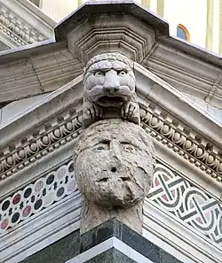 Female face on scarsella